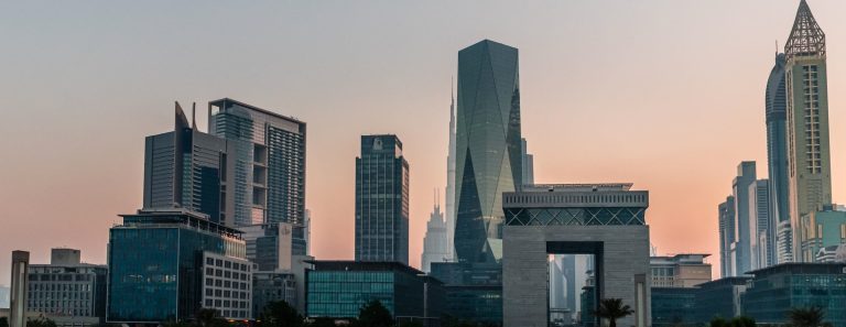 DIFC skyline at sunset with the Gate building, Dubai International Financial Centre district