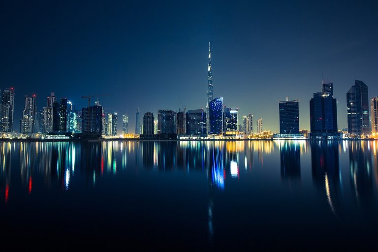 Dubai Business Bay skyline with Burj Khalifa - Dubai GDP growth and company setup for foreign investors