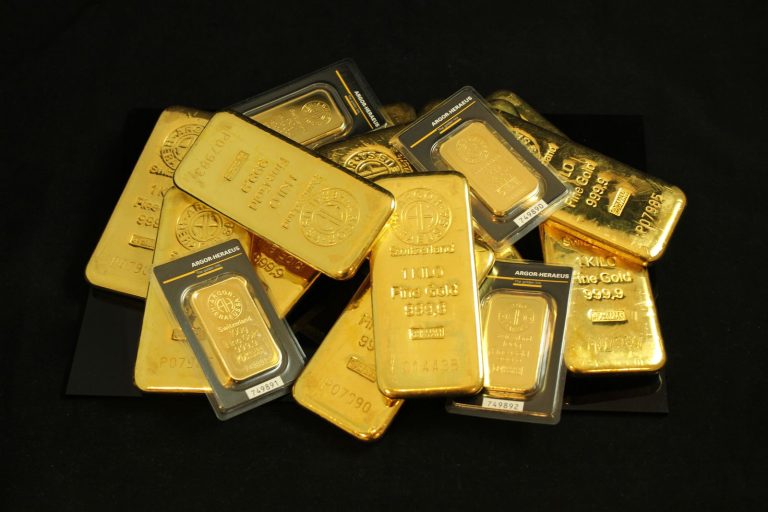 Stacked one-kilo fine gold bars, illustrating Dubai gold prices rising to AED 493.50 per gram for 24K in July 2026