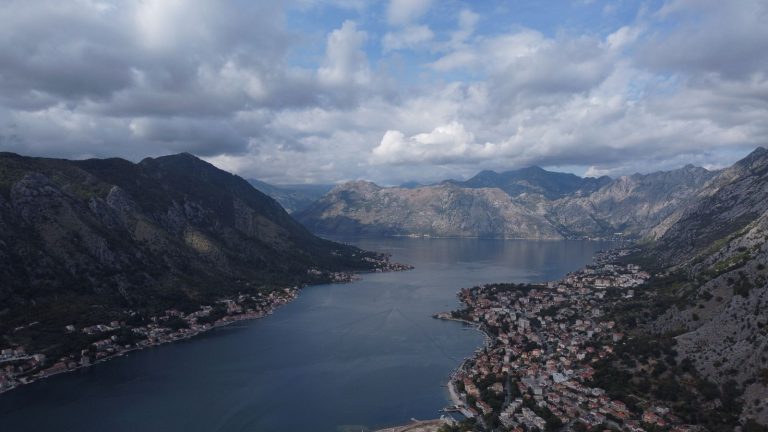 Aerial view of the Bay of Kotor in Montenegro with mountains and coastal towns, now visa-free for UAE residents with three years of residency